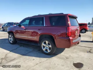 2019 Chevrolet Tahoe LT with VIN 1GNSCBKCXKR261399, listed as a Copart auction lot 46799495 with 74,193 mi miles and Salvage Title. Bid and sale history available at carsss.com. Image 2.
