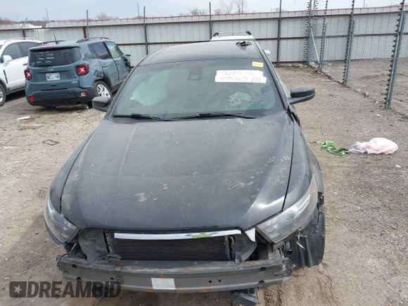 2013 Ford Taurus SHO z VIN 1FAHP2KT6DG174191, wystawiony jako IAAI lot #41752293 z przebiegiem 147 607 mil mil oraz . Historia ofert i sprzedaży dostępna na DreamBid. Obrazek 13.