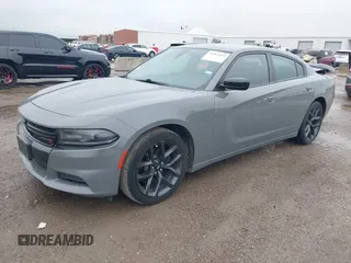2019 Dodge Charger SXT with VIN 2C3CDXBG7KH554272, listed as a IAAI auction lot 41964492 with 126,174 mi miles. Bid and sale history available at carsss.com. Image 2.