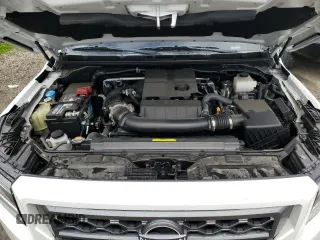 2023 Nissan Frontier SV z VIN 1N6ED1EJ8PN669001, wystawiony jako Copart lot #57530255 z przebiegiem 2 718 mil mil oraz Szkoda całkowita • Salvage title. Historia ofert i sprzedaży dostępna na DreamBid. Obrazek 11.