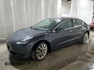 2018 Tesla Model 3 Long Range Battery z VIN 5YJ3E1EB2JF087126, wystawiony jako Copart lot #58263125 z przebiegiem 39 825 mil mil oraz Szkoda całkowita • Salvage title. Historia ofert i sprzedaży dostępna na DreamBid. Obrazek 1.