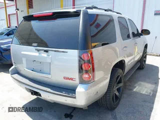 2010 GMC Yukon SLT with VIN 1GKUCCE00AR255901, listed as a IAAI auction lot 41967877 with 195,969 mi miles. Bid and sale history available at carsss.com. Image 4.