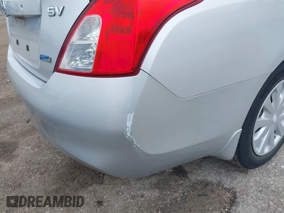 2012 Nissan Versa SV with VIN 3N1CN7AP5CL916413, listed as a IAAI auction lot 42184567 with 71,068 mi miles. Bid and sale history available at carsss.com. Image 6.