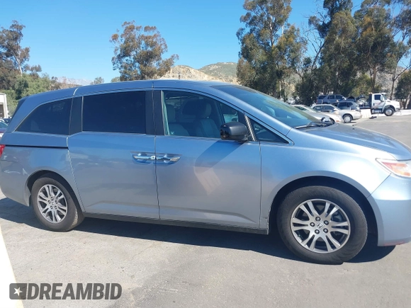 2012 Honda Odyssey EX-L with VIN 5FNRL5H69CB003067, listed as a IAAI auction lot 41862591 with 163,158 mi miles and . Bid and sale history available at carsss.com. Image 13.
