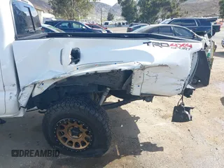 2018 Toyota Tacoma SR5 with VIN 3TMDZ5BN2JM037580, listed as a IAAI auction lot 42248418 with 35,661 mi miles and . Bid and sale history available at DreamBid. Image 6.