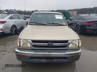 1999 Toyota Tacoma with VIN 4TAVL52N4XZ524059, listed as a IAAI auction lot 41761806 with 214,425 mi miles and . Bid and sale history available at DreamBid. Image 12.