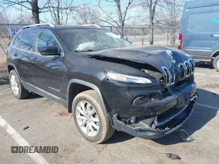 2015 Jeep Cherokee Limited with VIN 1C4PJMDSXFW578613, listed as a IAAI auction lot 41660723 with 102,036 mi miles. Bid and sale history available at carsss.com. Image 1.