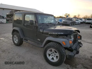 2005 Jeep Wrangler Rubicon with VIN 1J4FA69S55P317666, listed as a Copart auction lot 81782754 with 119,954 mi miles and Salvage Title. Bid and sale history available at carsss.com. Image 4.