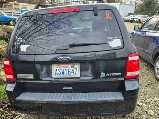 2011 Ford Escape Hybrid с VIN 1FMCU5K36BKB54964, выставлен на аукционе Copart как лот 82873554 с пробегом Не указан миль и Списание • Salvage title. История ставок и продаж доступна на DreamBid. Изображение 6.