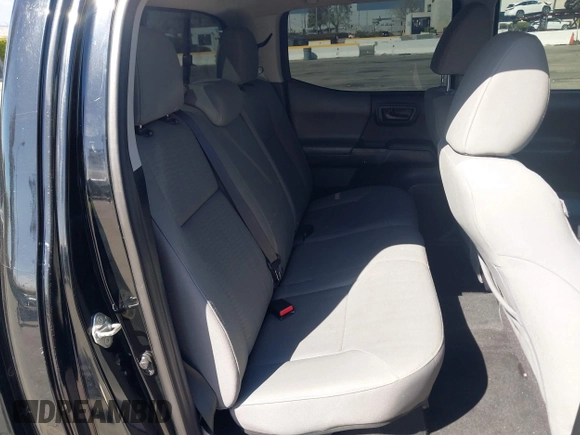 2018 Toyota Tacoma SR with VIN 3TMCZ5AN2JM127244, listed as a IAAI auction lot 41698199 with 61,535 mi miles and . Bid and sale history available at DreamBid. Image 8.