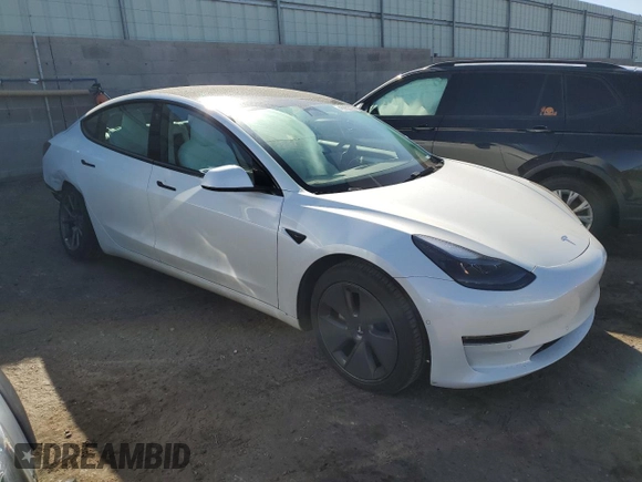 2022 Tesla Model 3 Long Range with VIN 5YJ3E1EB4NF249277, listed as a Copart auction lot 45952725 with Not Provided miles and Salvage Title. Bid and sale history available at DreamBid. Image 4.