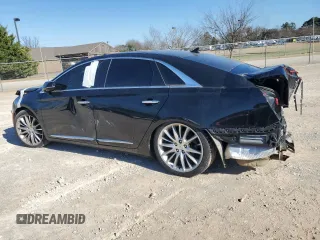 2014 Cadillac XTS Platinum z VIN 2G61W5S8XE9139247, wystawiony jako Copart lot #87930575 z przebiegiem 184 384 mil mil oraz Szkoda całkowita • Salvage title. Historia ofert i sprzedaży dostępna na DreamBid. Obrazek 2.