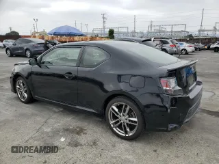 2015 Scion tC z VIN JTKJF5C75F3093123, wystawiony jako Copart lot #58414325 z przebiegiem 107 051 mil mil oraz Szkoda całkowita • Salvage title. Historia ofert i sprzedaży dostępna na DreamBid. Obrazek 2.