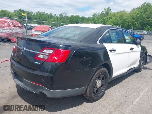 2014 Ford Police Interceptor with VIN 1FAHP2MKXEG185863, listed as a IAAI auction lot 42297860 with 115,188 mi miles and . Bid and sale history available at DreamBid. Image 4.