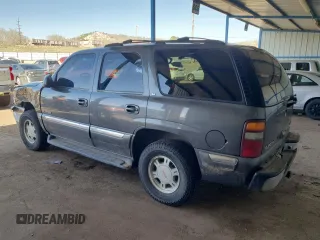 2001 GMC Yukon SLT z VIN 1GKEK13T21J165558, wystawiony jako Copart lot #52200565 z przebiegiem 291 699 mil mil oraz Szkoda całkowita • Salvage title. Historia ofert i sprzedaży dostępna na DreamBid. Obrazek 2.