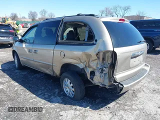 2002 Chrysler Town & Country EX with VIN 2C8GP74LX2R573857, listed as a IAAI auction lot 41846302 with Not Provided miles and . Bid and sale history available at carsss.com. Image 3.