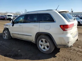2012 Jeep Grand Cherokee Laredo with VIN 1C4RJFAT5CC261417, listed as a Copart auction lot 50197345 with 131,256 mi miles and Clean Title. Bid and sale history available at carsss.com. Image 2.