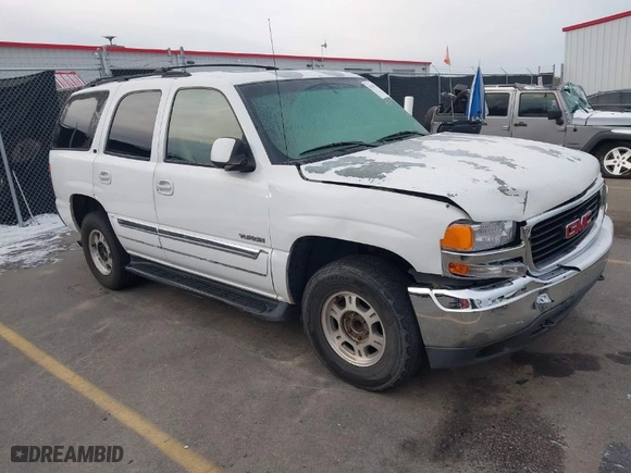 2002 GMC Yukon SLT with VIN 1GKEC13Z22J274962, listed as a IAAI auction lot 41387262 with 283,660 mi miles. Bid and sale history available at carsss.com. Image 1.