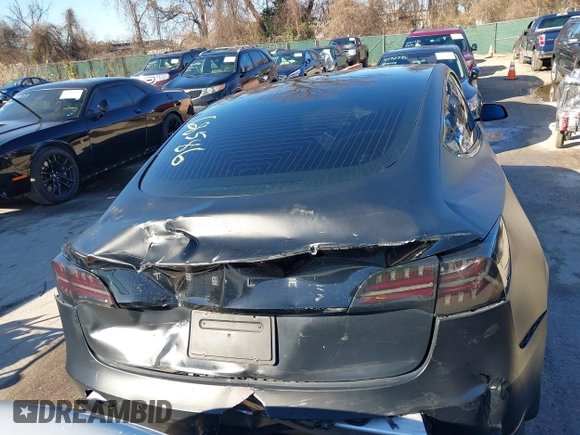 2020 Tesla Model 3 Standard Range Plus with VIN 5YJ3E1EA4LF745491, listed as a IAAI auction lot 41186726 with 74,575 mi miles and . Bid and sale history available at DreamBid. Image 16.