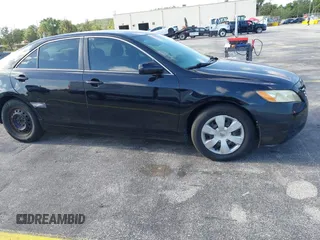 2009 Toyota Camry with VIN 4T1BE46K39U409721, listed as a IAAI auction lot 42160563 with 216,066 mi miles. Bid and sale history available at carsss.com. Image 6.
