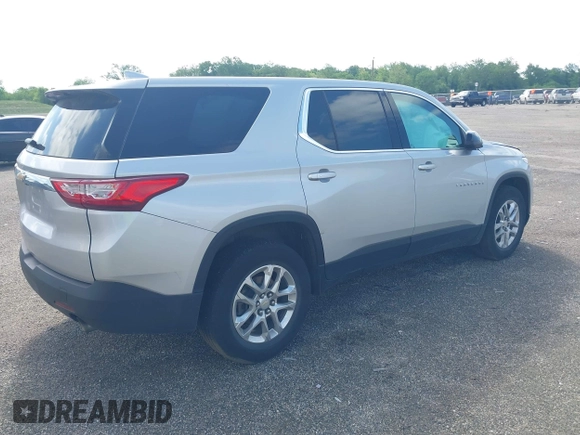 2021 Chevrolet Traverse LS with VIN 1GNERFKW3MJ200569, listed as a IAAI auction lot 42279102 with 73,783 mi miles and . Bid and sale history available at DreamBid. Image 4.