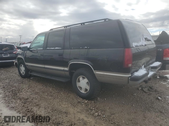 1997 Chevrolet Suburban with VIN 3GNFK16RXVG133472, listed as a Copart auction lot 48998175 with 180,543 mi miles and Salvage Title. Bid and sale history available at carsss.com. Image 2.