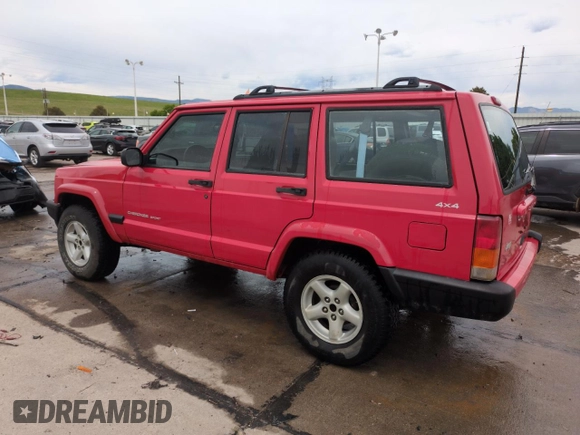 1999 Jeep Cherokee Sport with VIN 1J4FF68S2XL648735, listed as a Copart auction lot 58758115 with 252,248 mi miles and Salvage title. Bid and sale history available at DreamBid. Image 2.