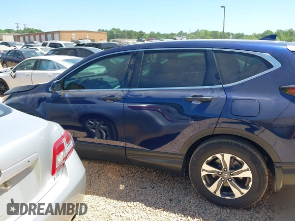 2020 Honda CR-V LX with VIN 2HKRW1H22LH412512, listed as a IAAI auction lot 42107381 with 60,062 mi miles and . Bid and sale history available at DreamBid. Image 15.