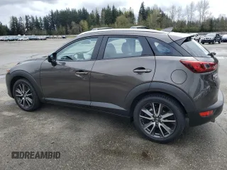 2017 Mazda CX-3 Touring with VIN JM1DKFC79H0148103, listed as a Copart auction lot 51343025 with 79,765 mi miles and Salvage Title. Bid and sale history available at DreamBid. Image 2.