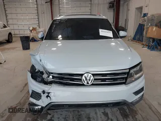 2019 Volkswagen Tiguan SE with VIN 3VV3B7AX9KM030028, listed as a IAAI auction lot 40445099 with 85,400 mi miles and . Bid and sale history available at DreamBid. Image 12.