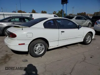 1995 Pontiac Sunfire SE z VIN 1G2JB1244S7508975, wystawiony jako Copart lot #76954164 z przebiegiem 76 187 mil mil oraz Tytuł czysty. Historia ofert i sprzedaży dostępna na DreamBid. Obrazek 3.