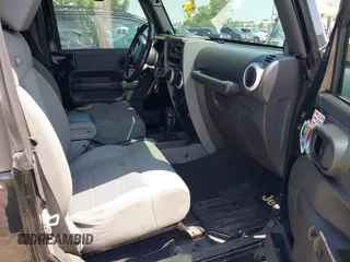 2009 Jeep Wrangler Sahara with VIN 1J4FA541X9L763737, listed as a IAAI auction lot 42721115 with 166,663 mi miles and . Bid and sale history available at DreamBid. Image 5.
