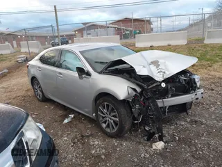 2016 Lexus ES 300h z VIN JTHBW1GGXG2109451, wystawiony jako IAAI lot #41168128 z przebiegiem 101 603 mil mil oraz . Historia ofert i sprzedaży dostępna na DreamBid. Obrazek 13.