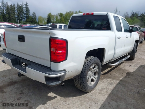 2017 Chevrolet Silverado 1500 LT with VIN 1GCVKREC7HZ131196, listed as a IAAI auction lot 42072336 with 158,140 mi miles. Bid and sale history available at carsss.com. Image 4.