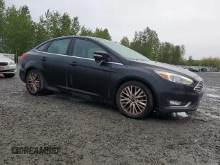 2015 Ford Focus Titanium with VIN 1FADP3J23FL269878, listed as a Copart auction lot 55171975 with 84,499 mi miles and Clean Title. Bid and sale history available at carsss.com. Image 4.
