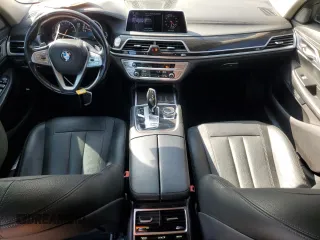 2017 BMW 7 Series 740i with VIN WBA7E2C50HG739565, listed as a Copart auction lot 64584885 with 114,496 mi miles and Salvage title. Bid and sale history available at DreamBid. Image 8.