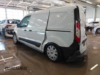 2023 Ford Transit Connect XL with VIN NM0LS7S2XP1549933, listed as a IAAI auction lot 41356867 with 28,986 mi miles and . Bid and sale history available at DreamBid. Image 3.