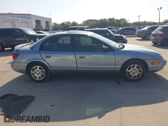 2002 Saturn SL z VIN 1G8ZK54702Z130021, wystawiony jako IAAI lot #42091064 z przebiegiem 68 754 mil mil oraz . Historia ofert i sprzedaży dostępna na DreamBid. Obrazek 13.