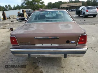 1989 Ford Crown Victoria z VIN 2FABP74F3KX157785, wystawiony jako Copart lot #84102954 z przebiegiem 68 996 mil mil oraz Czysty tytuł • Clean title. Historia ofert i sprzedaży dostępna na DreamBid. Obrazek 6.