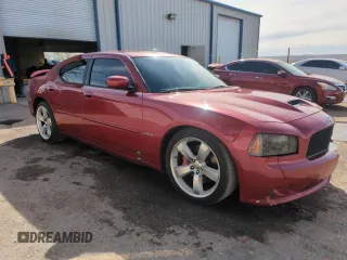 2006 Dodge Charger SRT-8 with VIN 2B3LA73W56H369414, listed as a Copart auction lot 49818765 with 117,563 mi miles and Salvage Title. Bid and sale history available at DreamBid. Image 4.