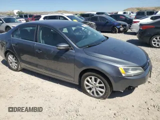 2013 Volkswagen Jetta SE with VIN 3VWDX7AJ3DM271048, listed as a Copart auction lot 59257995 with 122,393 mi miles and Salvage title. Bid and sale history available at DreamBid. Image 4.