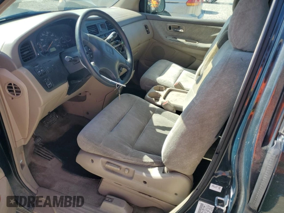 2000 Honda Odyssey EX z VIN 2HKRL1867YH587616, wystawiony jako Copart lot #57258795 z przebiegiem 219 999 mil mil oraz Szkoda całkowita • Salvage title. Historia ofert i sprzedaży dostępna na DreamBid. Obrazek 7.