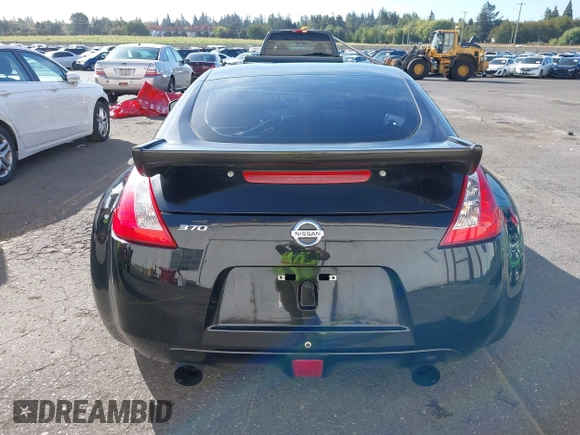 2013 Nissan 370Z z VIN JN1AZ4EH1DM880739, wystawiony jako IAAI lot #40474120 z przebiegiem 76 369 mil mil oraz . Historia ofert i sprzedaży dostępna na DreamBid. Obrazek 16.