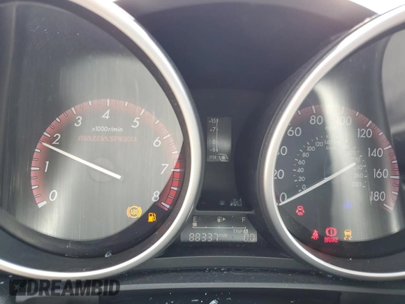 2012 Mazda 3 Mazdaspeed3 Touring z VIN JM1BL1L41C1693096, wystawiony jako Copart lot #58041335 z przebiegiem 88 337 mil mil oraz Szkoda całkowita • Salvage title. Historia ofert i sprzedaży dostępna na DreamBid. Obrazek 9.