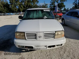 1999 Oldsmobile Bravada z VIN 1GHDT13W1X2704151, wystawiony jako Copart lot #76802764 z przebiegiem 155 630 mil mil oraz Szkody całkowita. Historia ofert i sprzedaży dostępna na DreamBid. Obrazek 5.