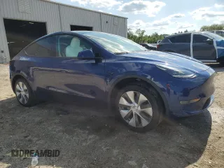 2023 Tesla Model Y Long Range z VIN 7SAYGDEE3PA178832, wystawiony jako Copart lot #57156005 z przebiegiem 12 920 mil mil oraz Szkody całkowita. Historia ofert i sprzedaży dostępna na DreamBid. Obrazek 4.