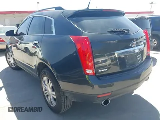 2014 Cadillac SRX z VIN 3GYFNAE35ES610751, wystawiony jako IAAI lot #41832296 z przebiegiem 133 293 mil mil oraz . Historia ofert i sprzedaży dostępna na DreamBid. Obrazek 3.
