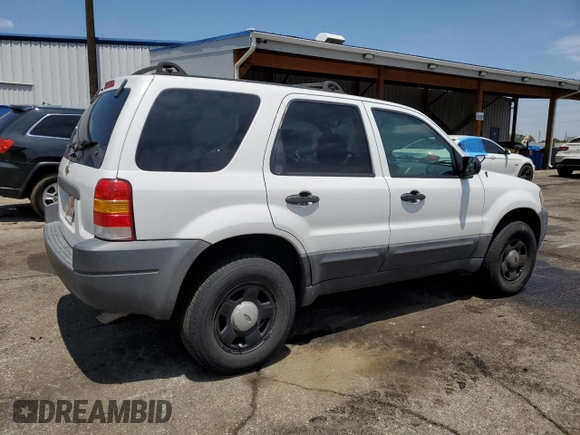2004 Ford Escape XLS with VIN 1FMCU92114DA15564, listed as a Copart auction lot 59358015 with 186,135 mi miles and Salvage title. Bid and sale history available at DreamBid. Image 3.