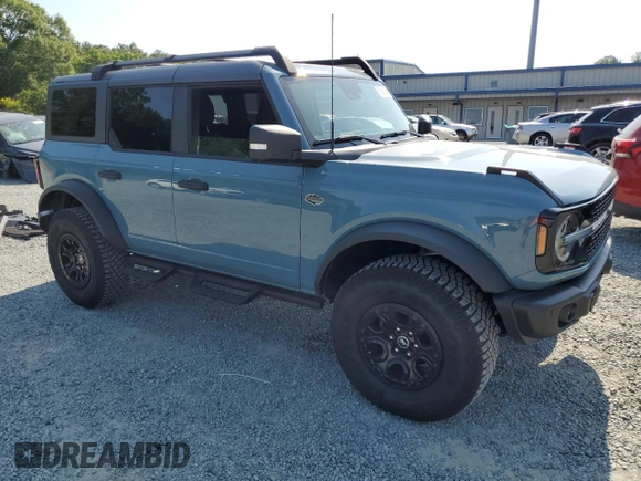 2023 Ford Bronco with VIN 1FMEE5DP7PLB67908, listed as a Copart auction lot 61641545 with 10,256 mi miles and Salvage title. Bid and sale history available at DreamBid. Image 4.