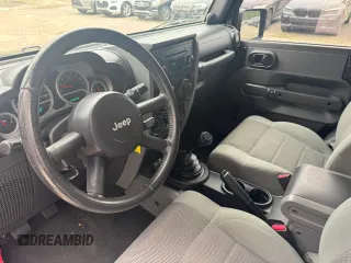 2007 Jeep Wrangler Rubicon с VIN 1J4GA64127L170574, выставлен на аукционе Copart как лот 60906965 с пробегом 142 976 миль миль и Чистый • Clean title. История ставок и продаж доступна на DreamBid. Изображение 9.